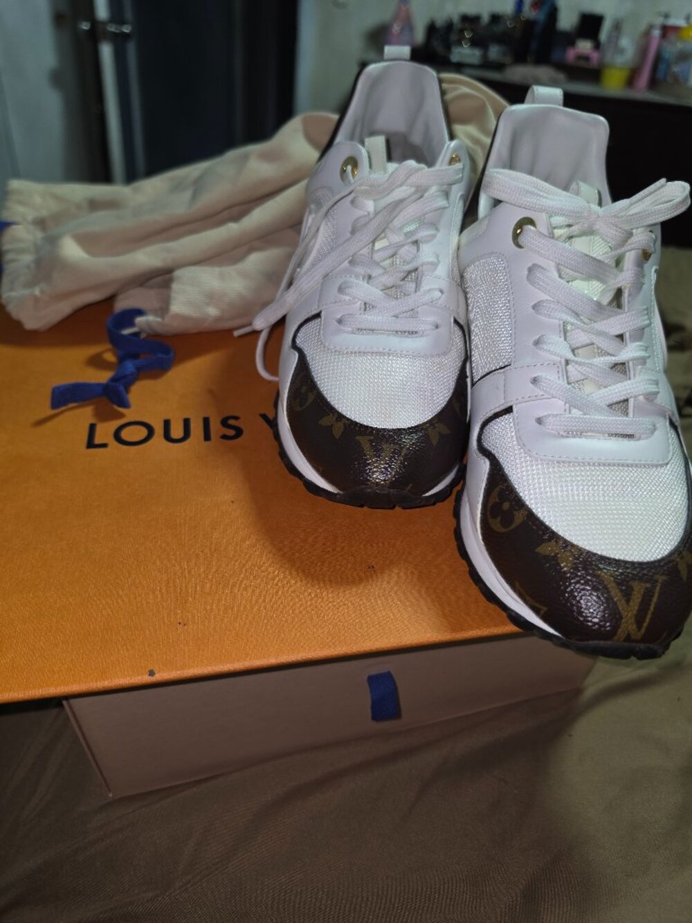 Louis vutton brown , white and gold run away gym shoes